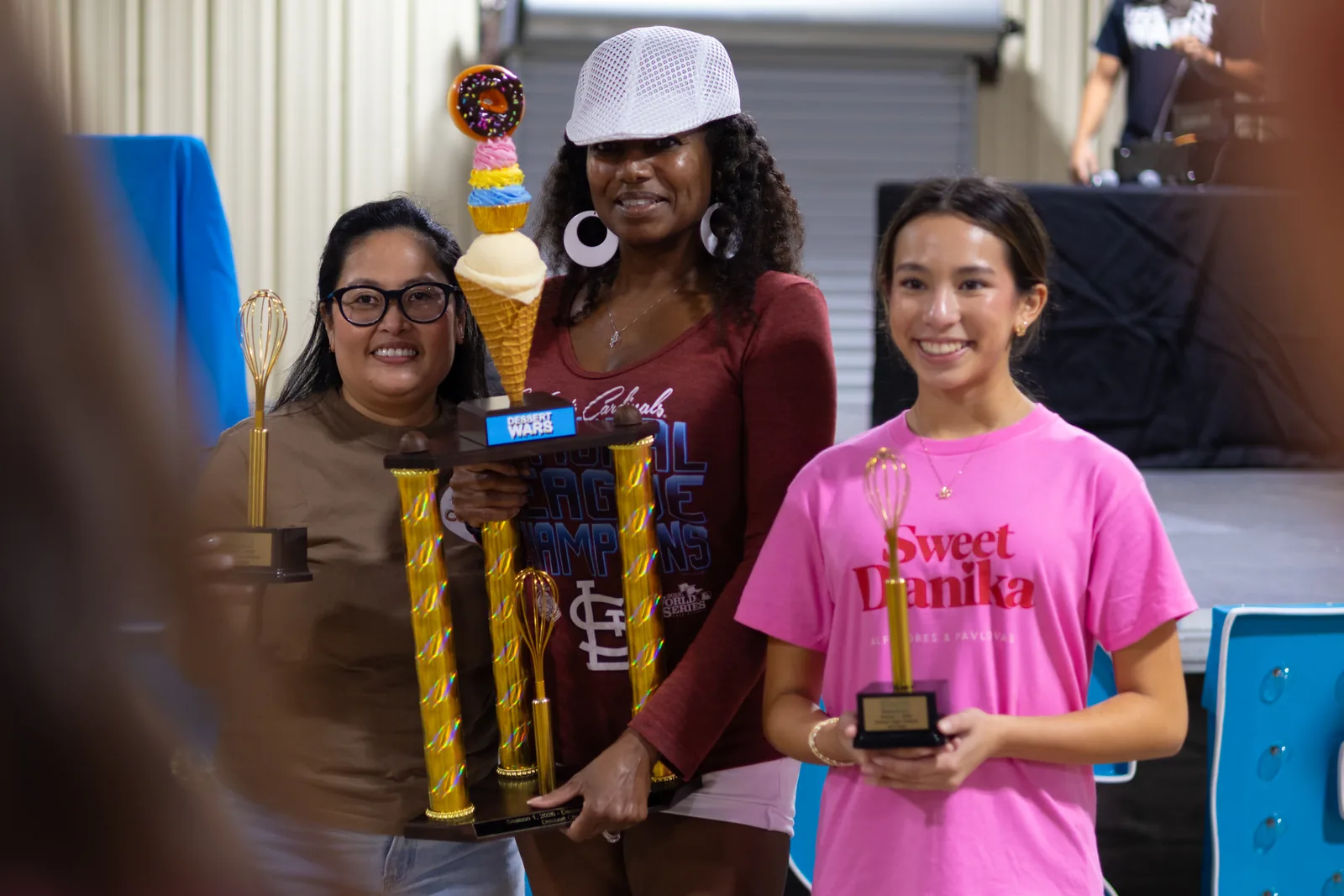 Sweet Danica holding her third place trophy at Dessert Wars Orlando.