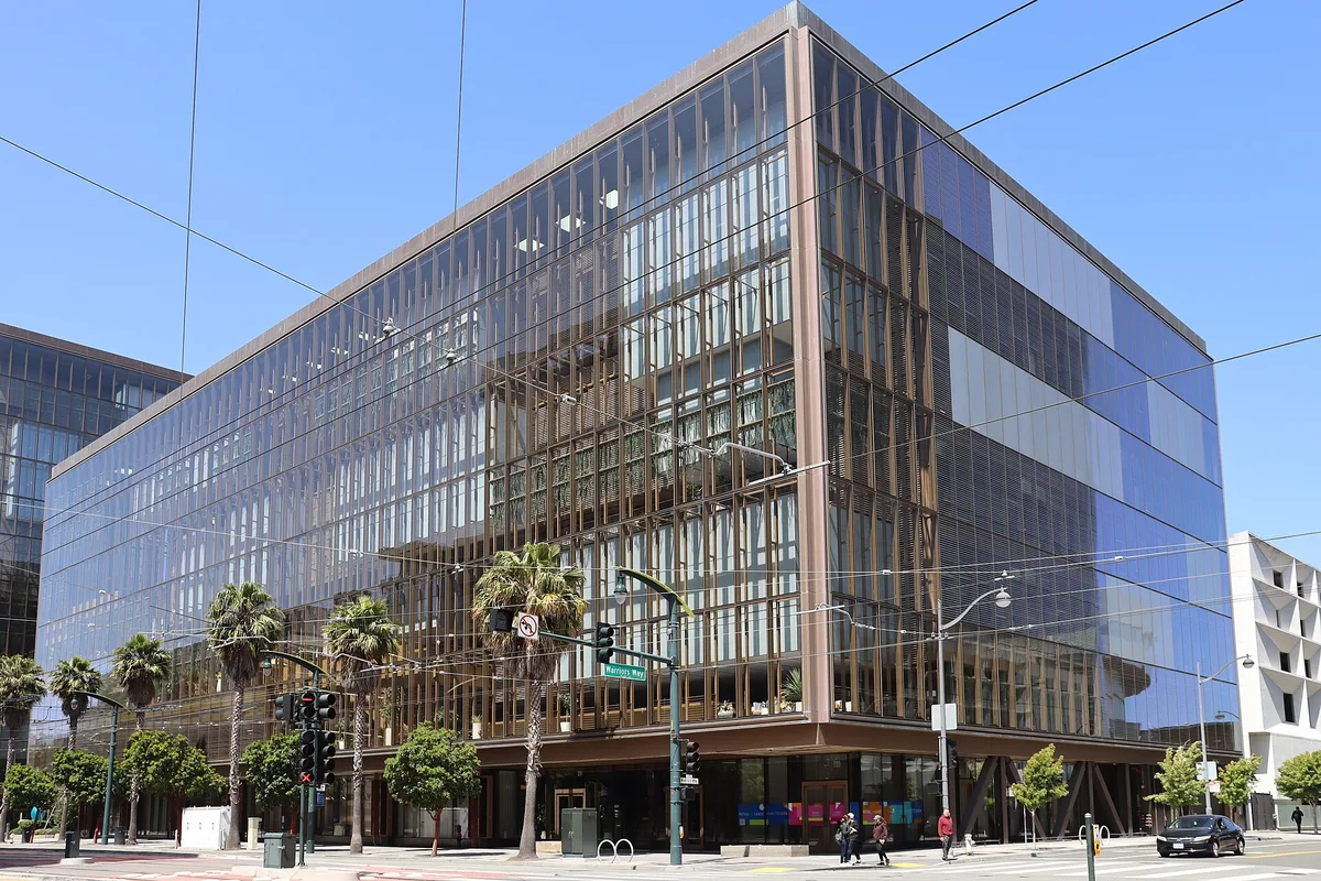 The glass office building at 1515 Third Street in San Francisco, an OpenAI headquarters building, seen from the street
